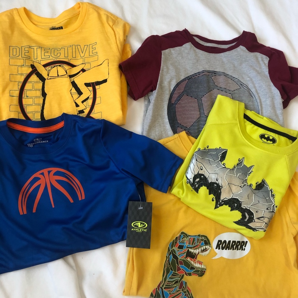 Lot of boys short sleeve shirts.